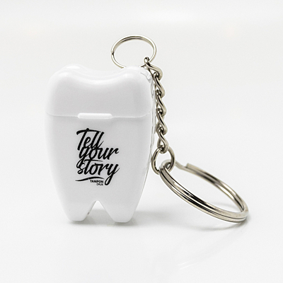 TOOTHY keychain with dental floss, white
